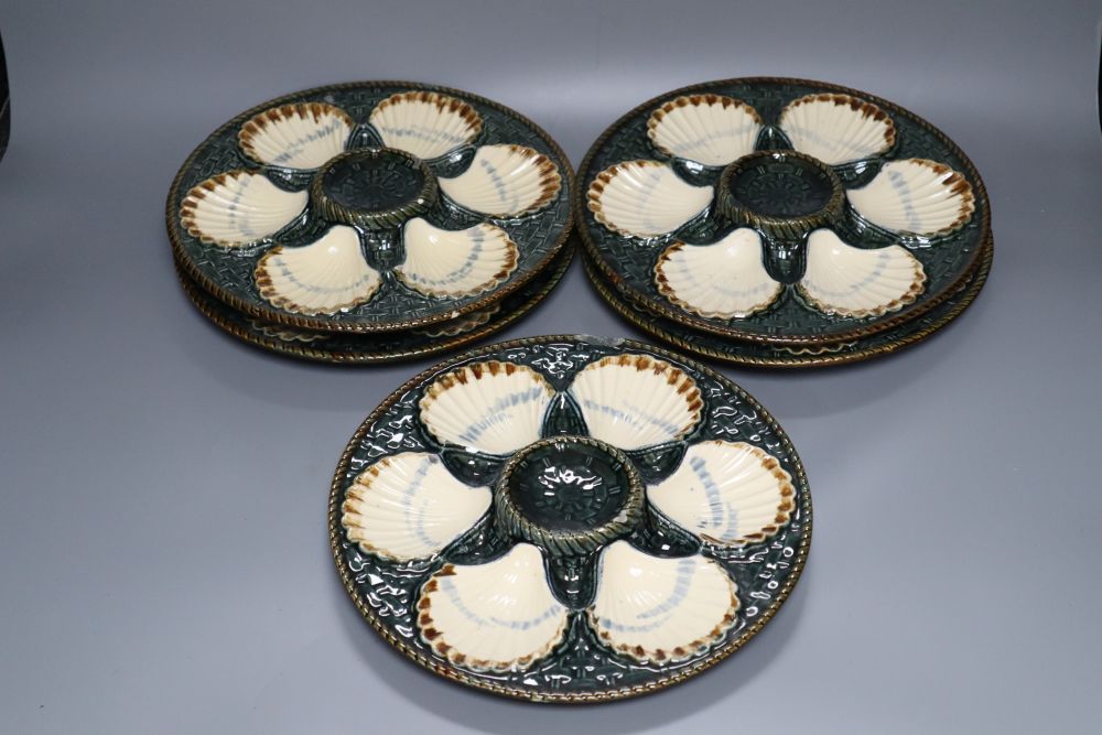 A set of five Longchamp maiolica oyster dishes, 24cm